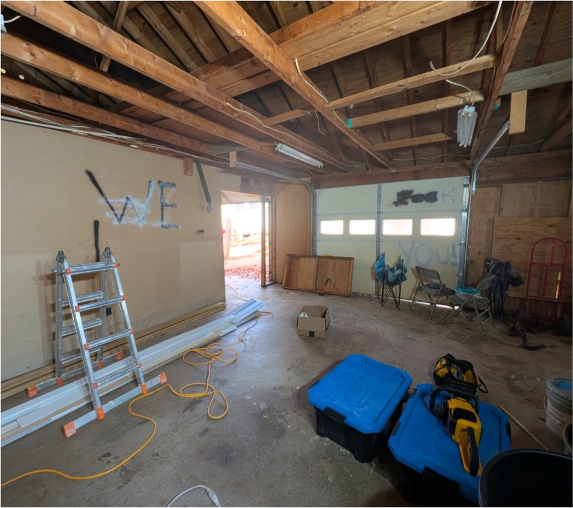 Before garage interior awaiting conversion
